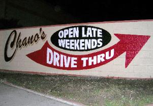 Painted wall sign on cinderblock wall