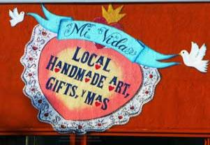 Painted wall sign for Mi Vida