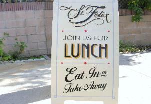 A-frame sidewalk sign, hand-lettered